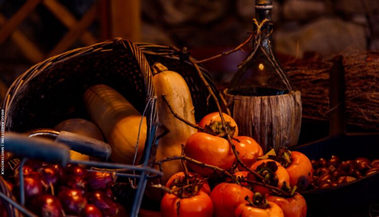 persimmon, chestnuts,butternut squash, pumpkin and flagon of wine