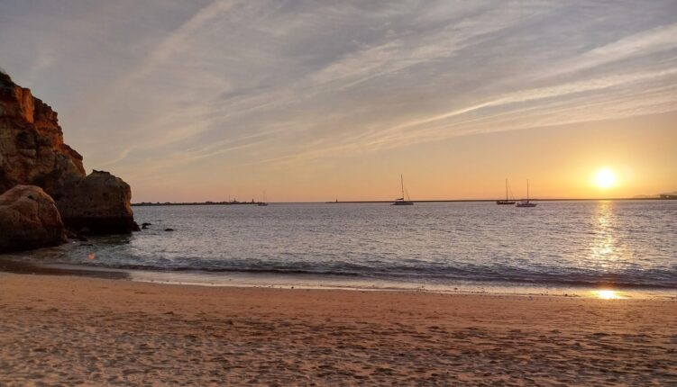 Praia Grande beach with boats at anchor