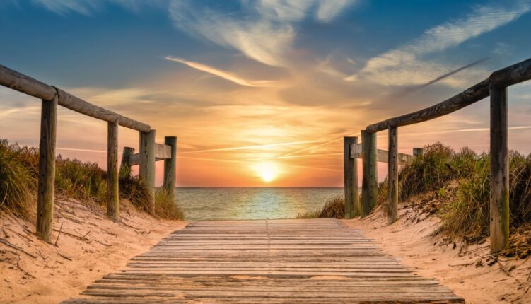 decking down to Algarve beach at sunset